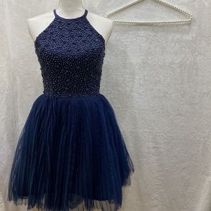Stunning beaded and tulle dress very well made!